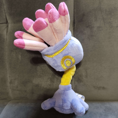 Lileep plush photographed from a three-quarters angle